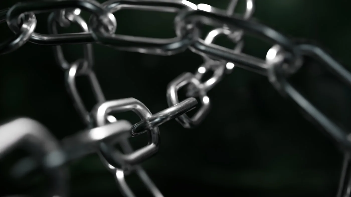 A heavy metal chain with one link broken open